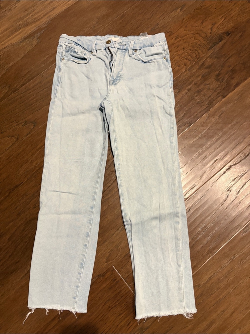 Good American Light Blue Straight Leg Jeans with Frayed Hem
